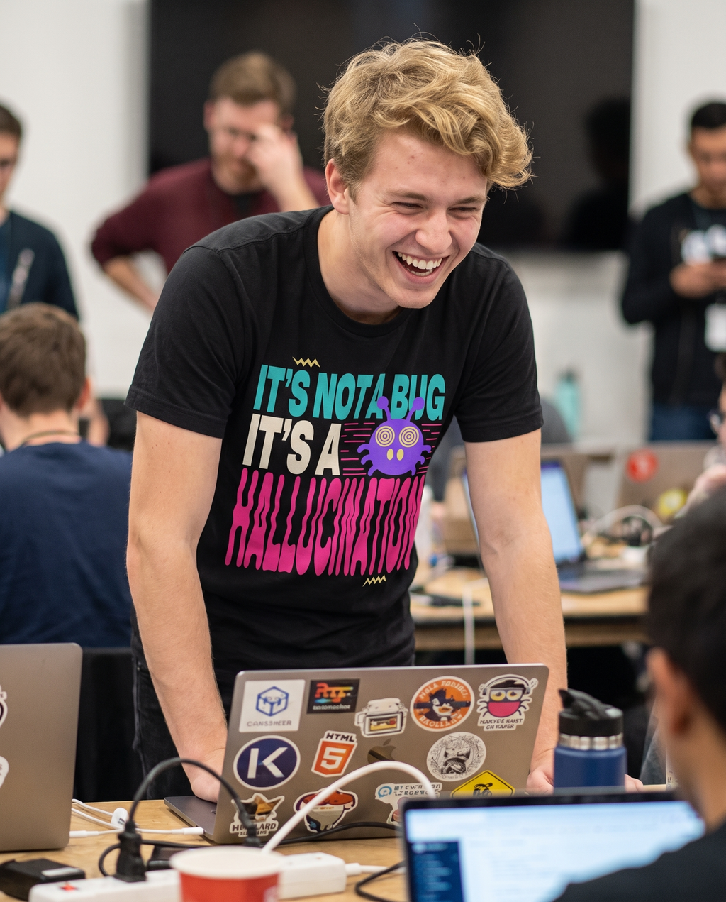 IT'S NOT A BUG IT'S A HALLUCINATION tee — black, hackathon lifestyle