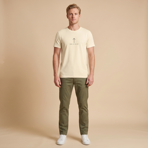 HUMAN IN THE LOOP tee — natural cream shirt on model, arrow design